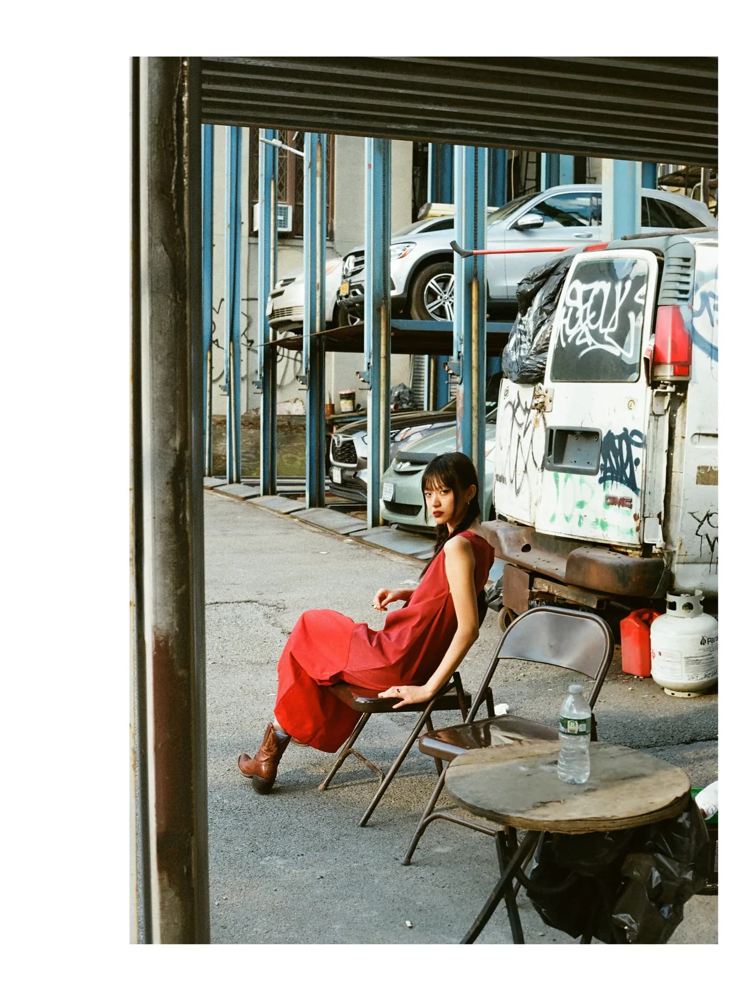 Red trousers outside a storefront.