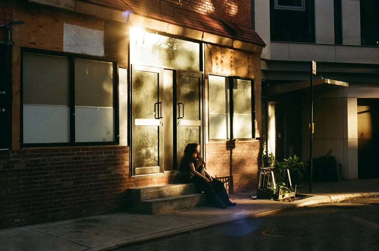 Golden light across a shop window.