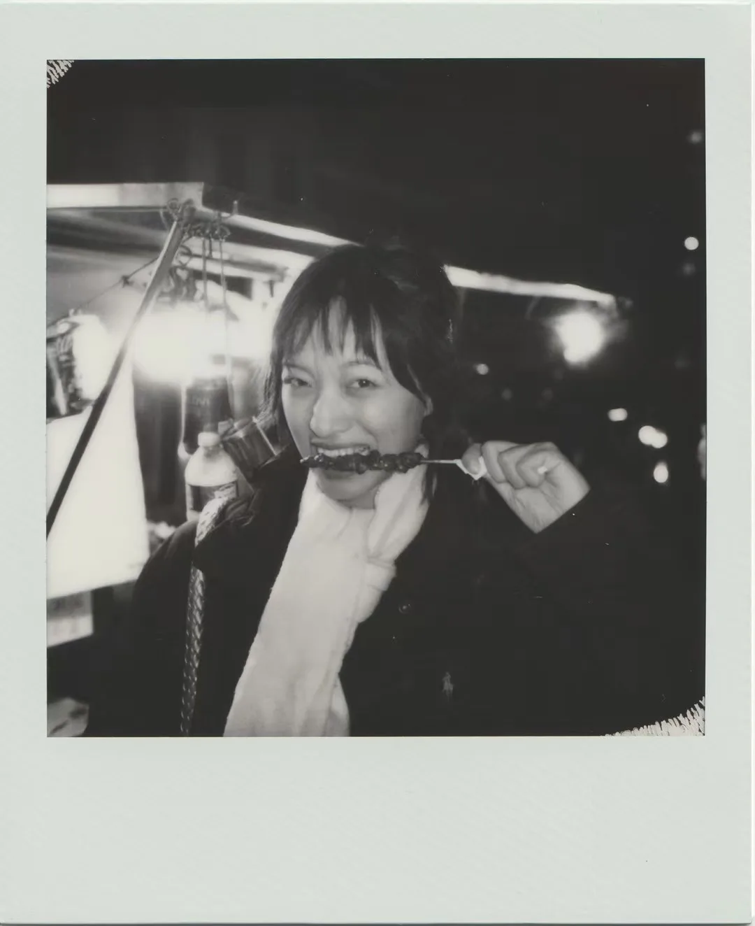 A monochrome instant portrait.