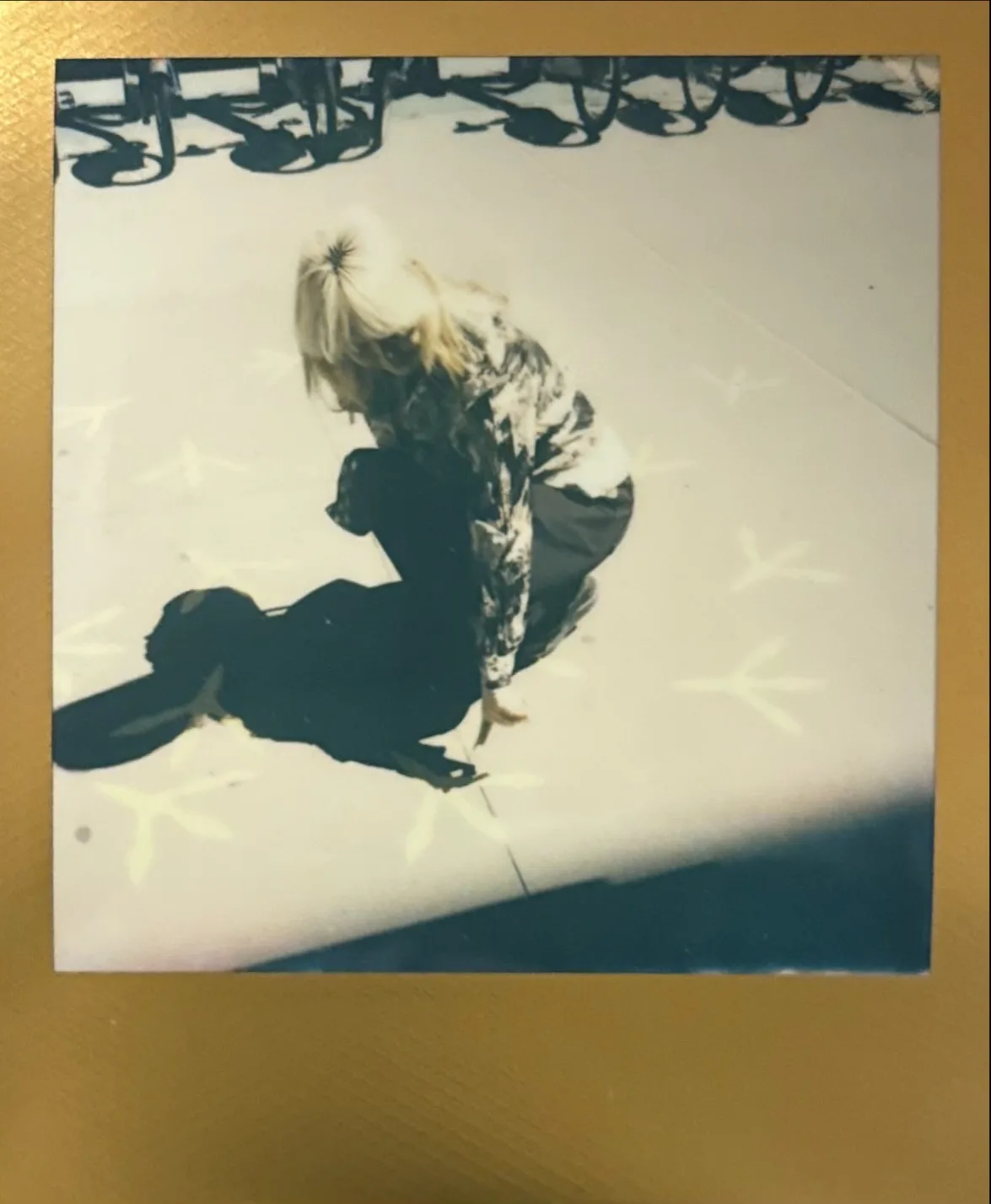 A golden-toned instant portrait.